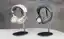 Two prototype headsets on desk stands, one pale gold and one slate grey. Image: Nudge, https://nudge.com/blog/about/